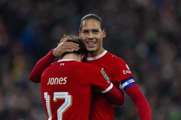 LIVERPOOL, ENGLAND - Wednesday, December 20, 2023: Liverpool's Curtis Jones (L) celebrates with team-mate captain Virgil van Dijk after scoring the second goal, the club's 500th in the competition. during the Football League Cup Quarter-Final match between Liverpool FC and West Ham United FC at Anfield. (Photo by David Rawcliffe/Propaganda)