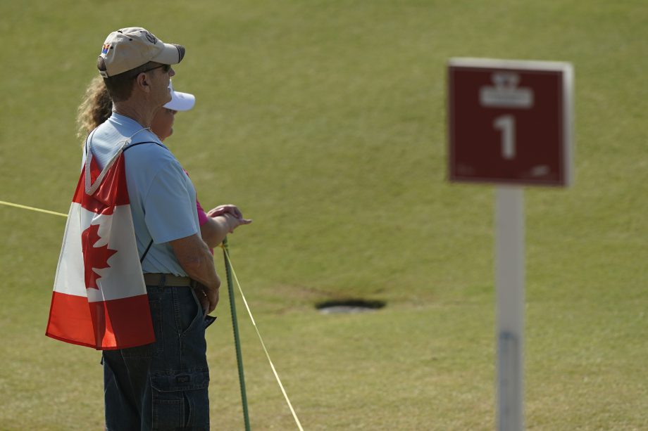 THE COLONY, TX - OCTOBER 05: A couple watches as Brooke Henderson